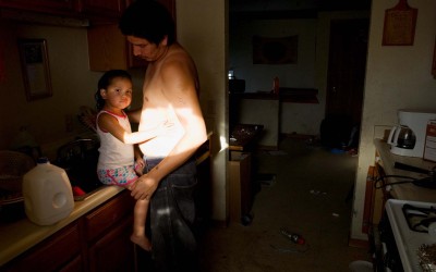 Father and daughter, Allen, Pine Ridge Reservation.  Allen has been called the poorest town in America.  Over 90 percent of Pine Ridge residents live below the federal poverty line, and the unemployment rate hovers between 85 and 90 percent.