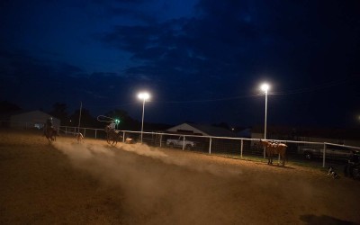 Springdale, Arkansas:  Friends and neighbors stop by the Moores’ arena with their horses to practice riding and steer roping.