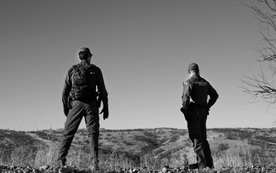 Nogales, Arizona.  USA 2013 - US border patrol agents looks for tracks left behind by migrants who cross into the United States from  Nogales, Sonora, Mexico, into Nogales Arizona.