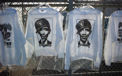 T-shirts for sale on International Avenue, with Oakland Raiders and Obama theme.